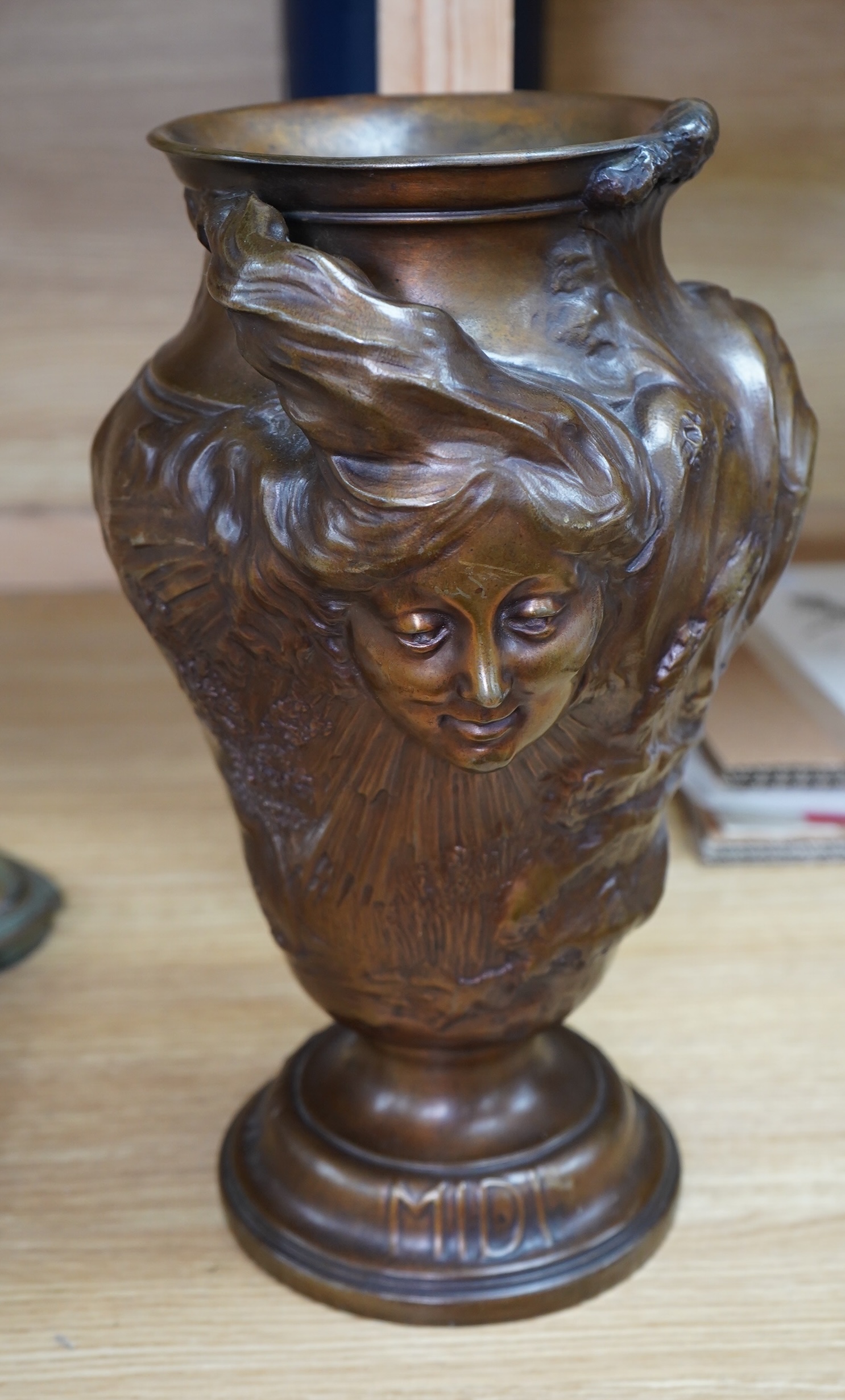 P. Legastelois. An Art Nouveau three sided figural bronze vase, MIDI, SOIR, MATIN written near base, 34cm high. Condition - good